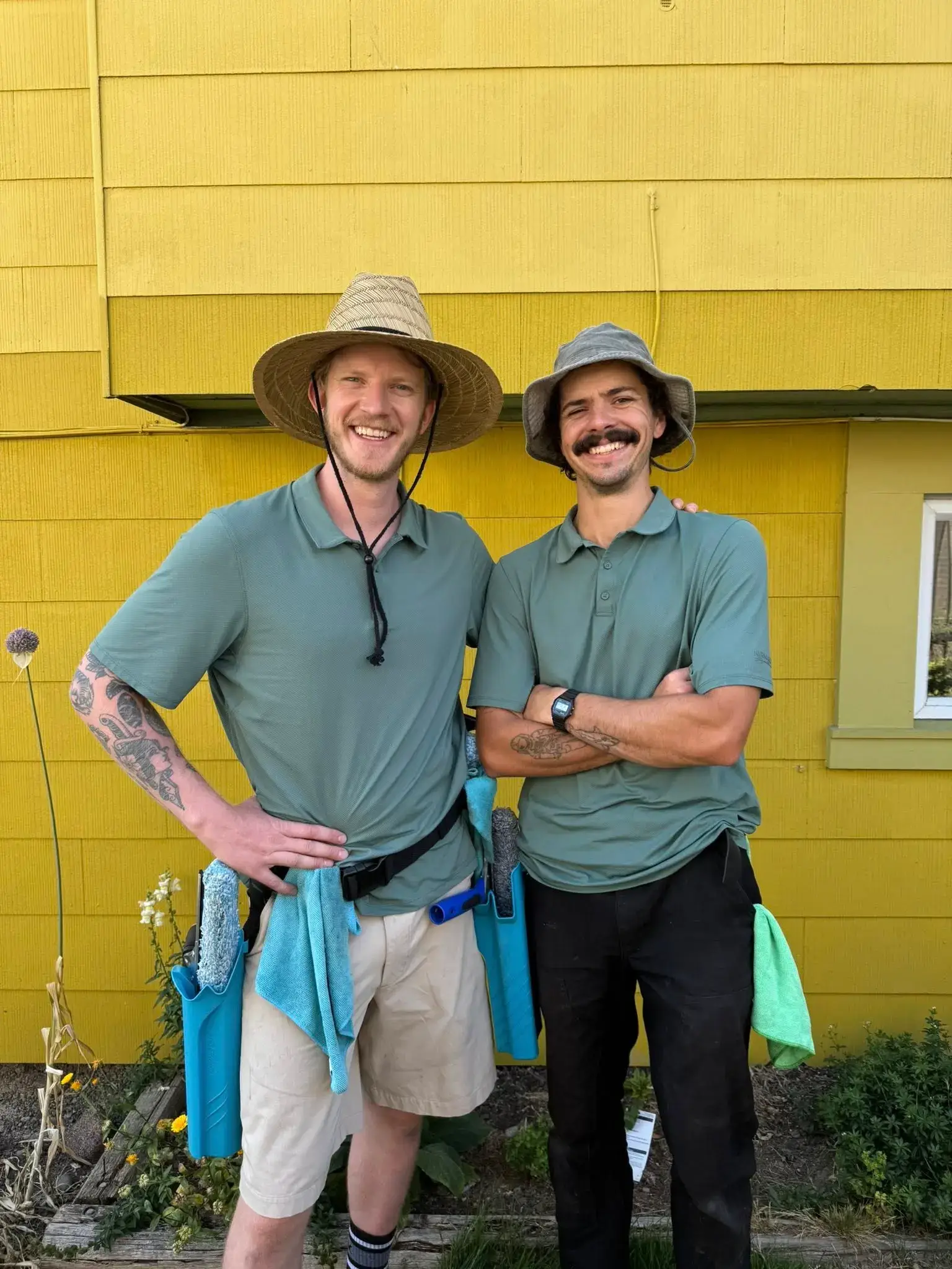 Axel & Mitchell, the owners of Two Pines Exterior Solutions, window cleaning in Victoria, BC.